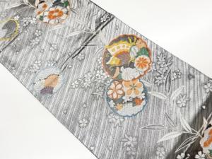 雪輪に蝶・草花模様織出し袋帯